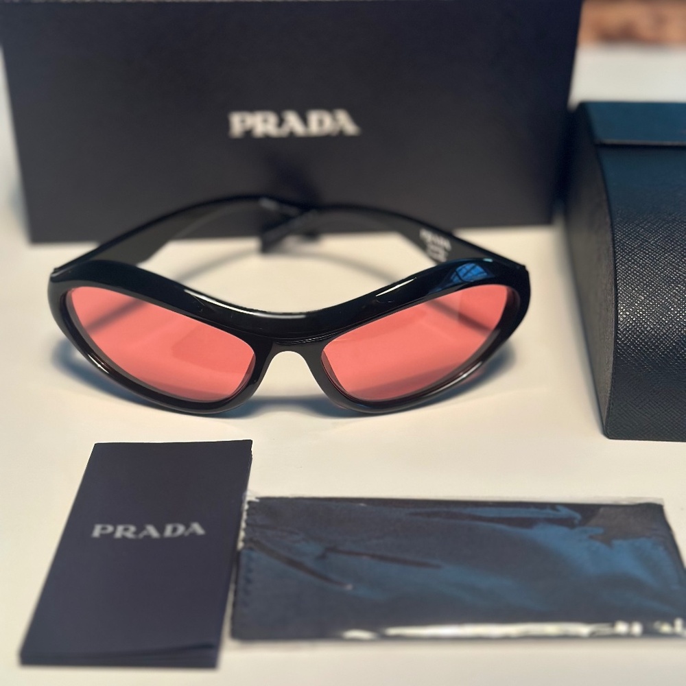 Prada Black Frame Sunglasses with Pink Lenses